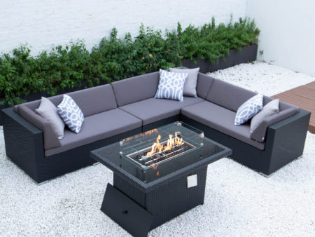 Giant L with wicker fire table in dark grey cushions